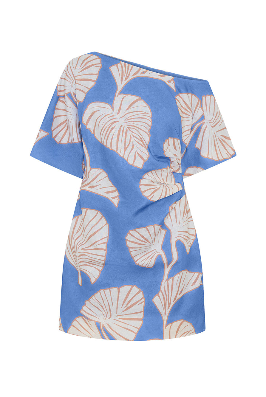 Blue dress with beige leaf pattern on a white background