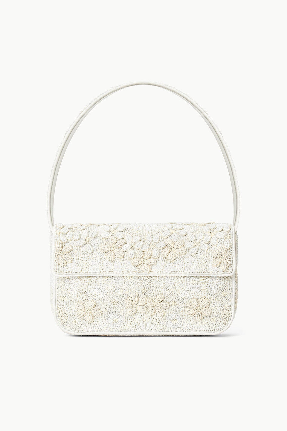 White handbag with floral embroidery on a white background