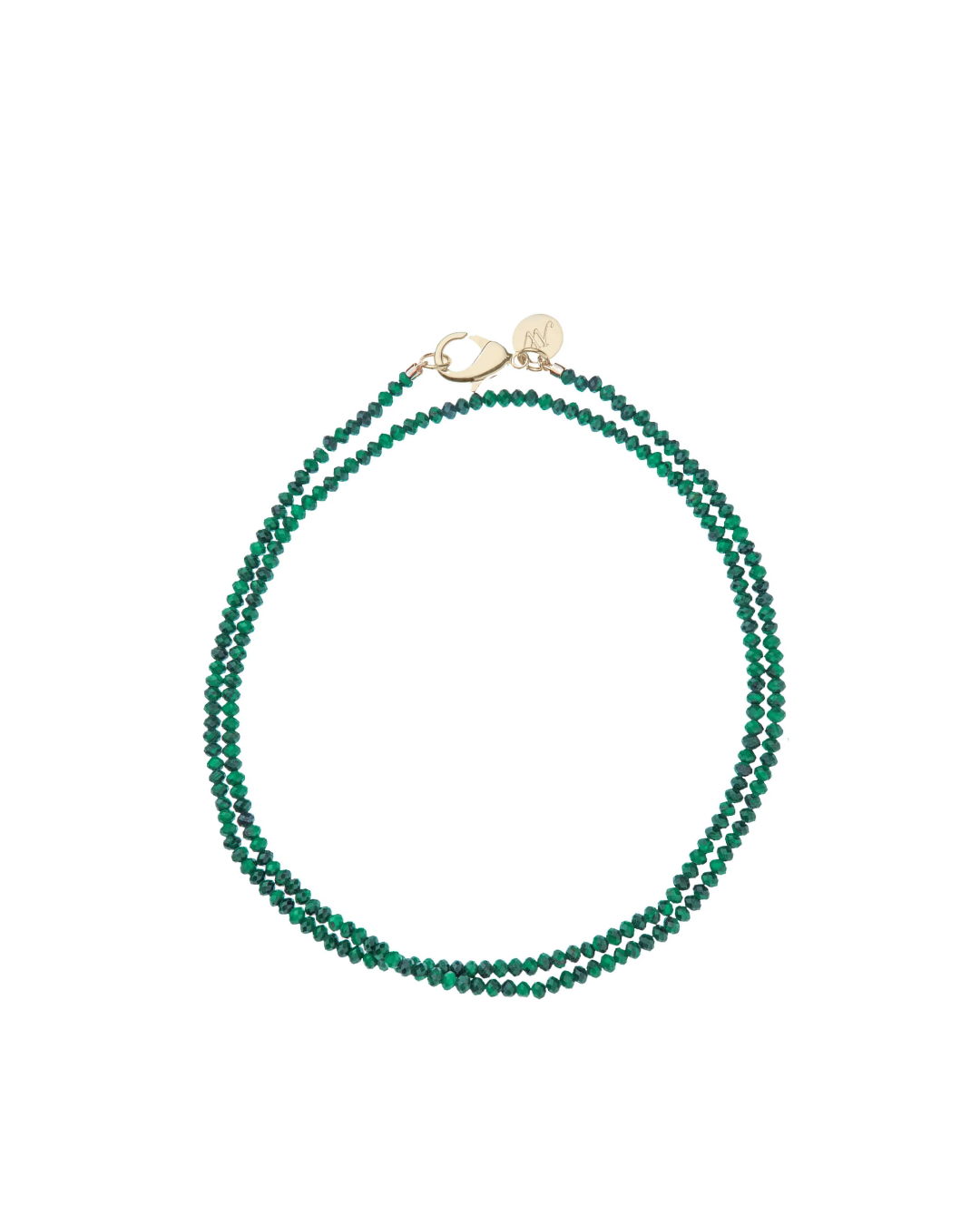 Green beaded necklace on a white background