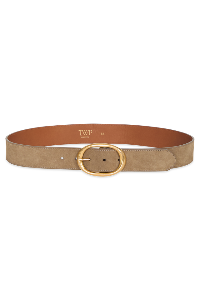 Tan belt with gold buckle on a white background